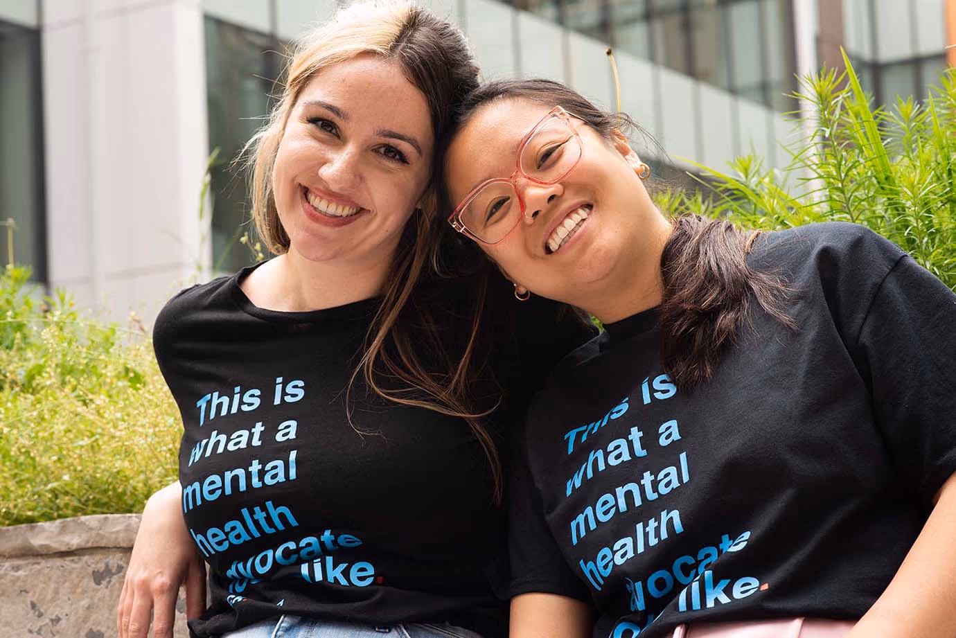 Two participants smiling and wearing jack.org merch