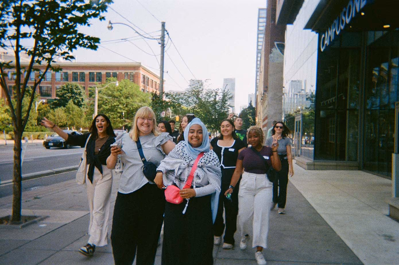 Group of participants walking through the streets