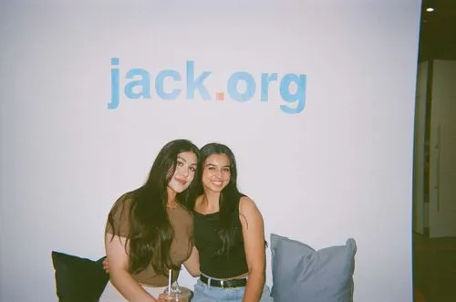 Jack.org office two network reps sitting on couch in vintage photo