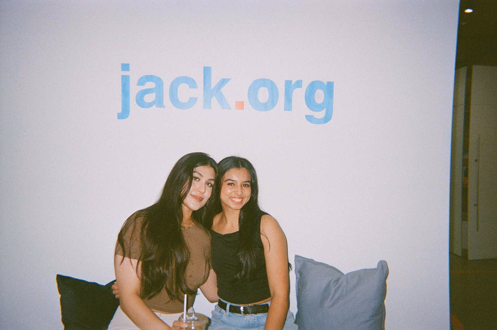 Jack.org office two network reps sitting on couch in vintage photo