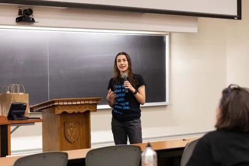 Jack talk speaker presenting in a classroom with jack.org tshirt