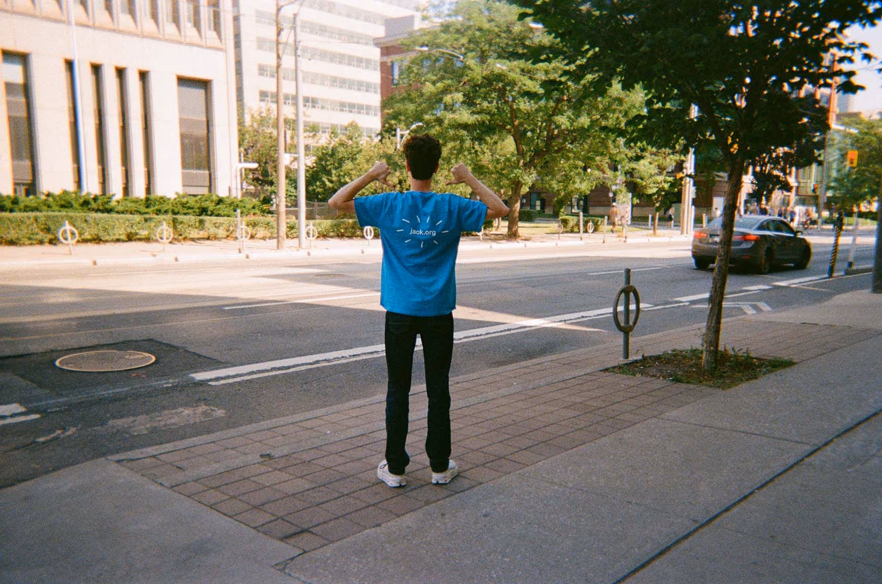 Participant wearing a t-shirt of jack.org merch on the street