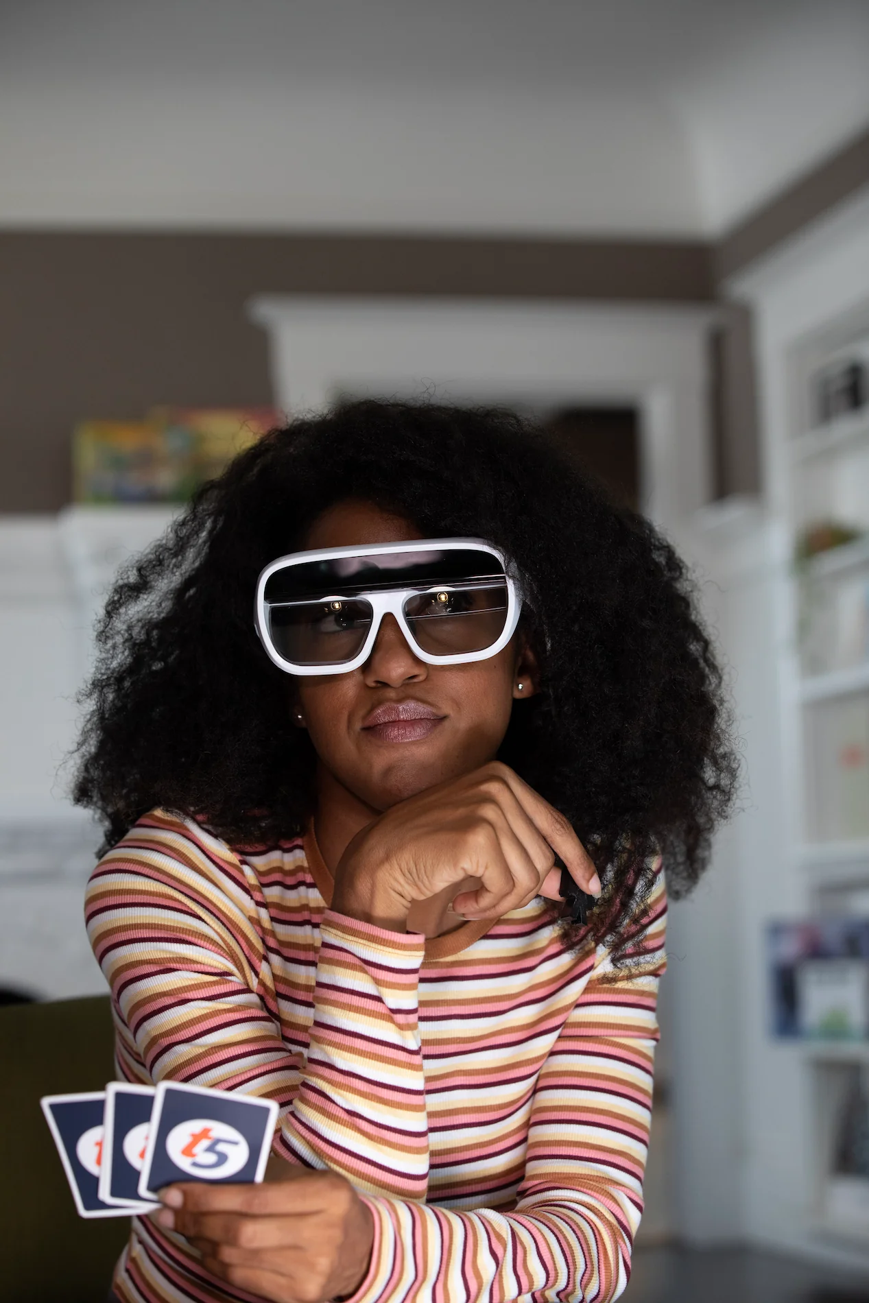 WOman looking at camera wearing tilt five glasses