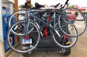 road bikes mounted on jeep's spare tire rack