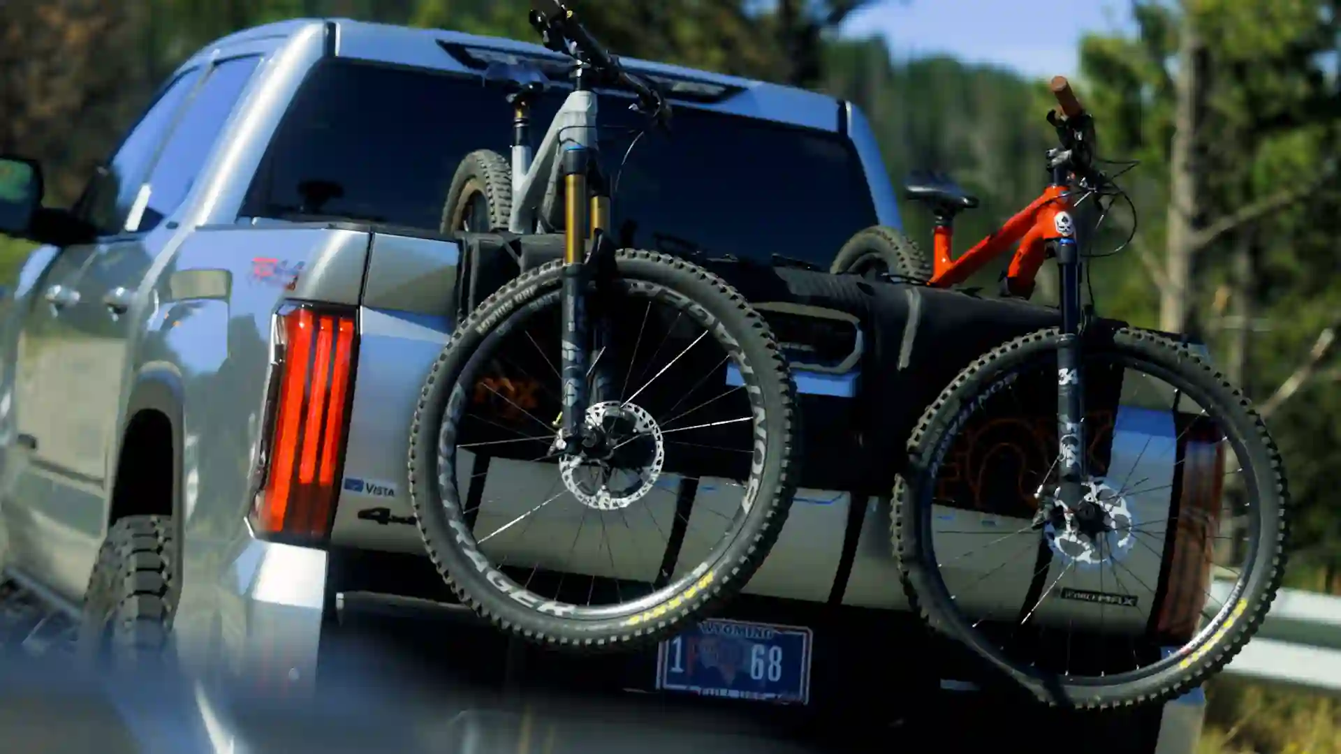 Two mountain bikes mounted on the back of a new Toyota Tundra from Toyota Vista in Casper, Wyoming, used in a Checked In Media video production advertisement for Hilltop Bank.