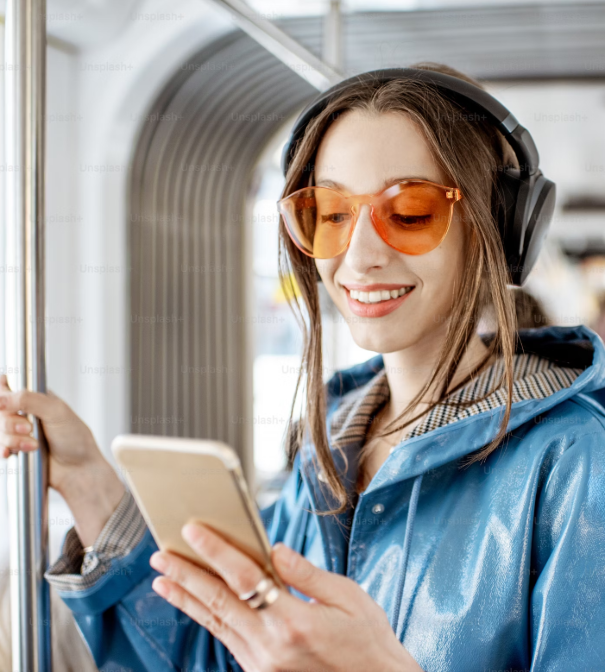 An  image of girl watching something on phone