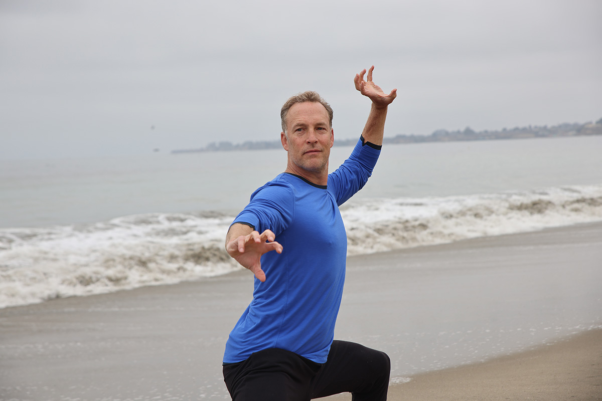 Qi Gong practice on the beach at sunrise