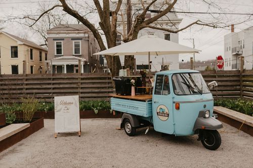 Italian Vespa scooter set up as mobile espresso cart for a private event