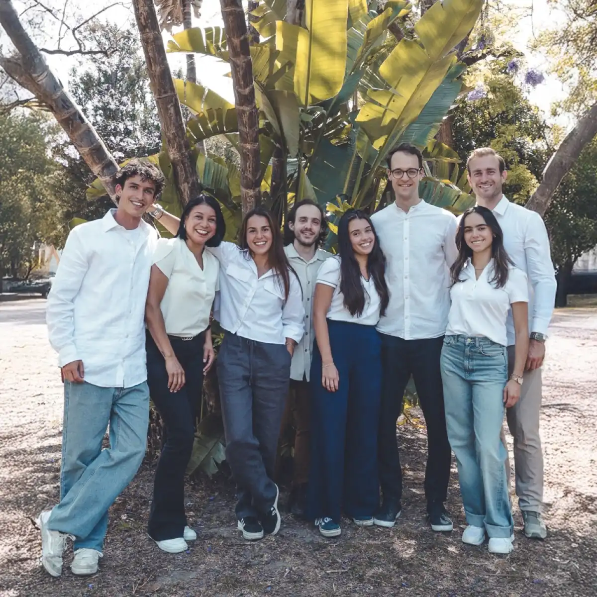 Bleisured team, photographed in the Jardim do Príncipe Real in Lisbon, in front of a banana tree