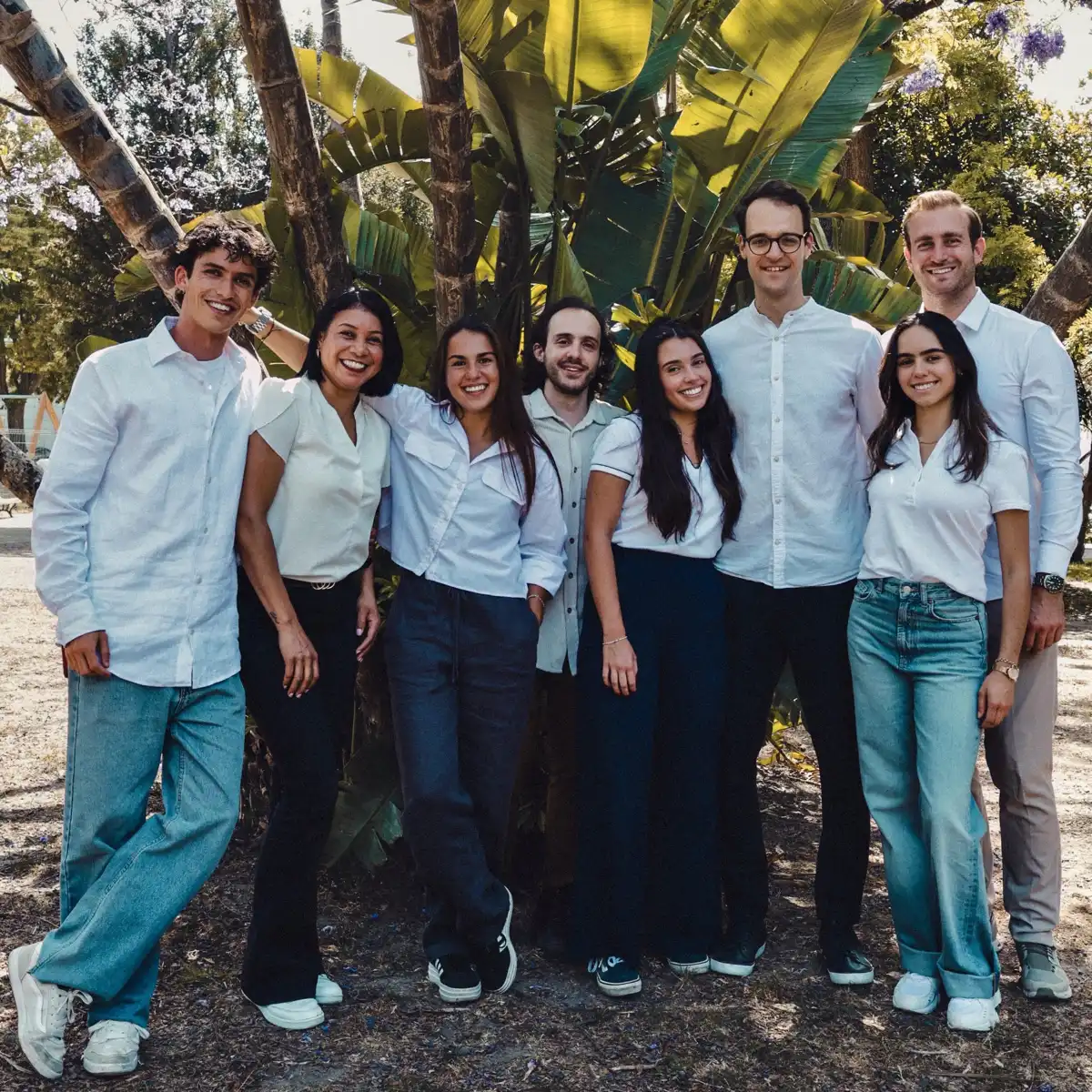 Bleisured team, photographed in the Jardim do Príncipe Real in Lisbon, in front of a banana tree