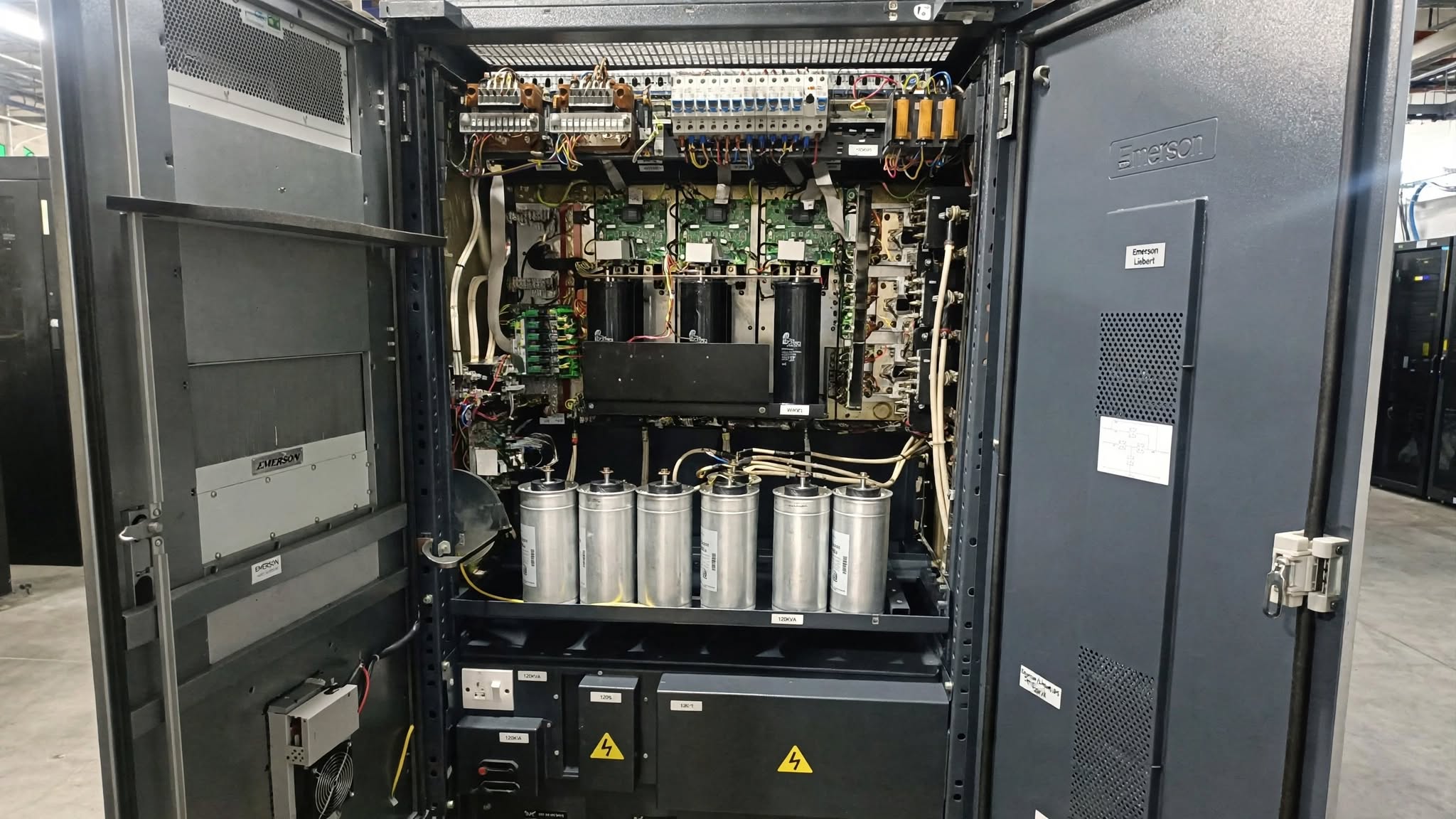Impact of AC and DC Capacitors Aging on UPS Reliability and Performance