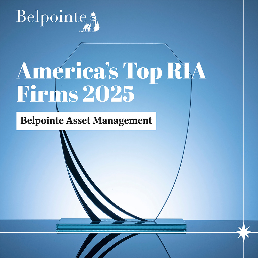 Belpointe's modern office building made of red brick and a lot of windows.