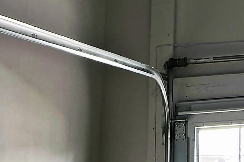 Garage Door Track Damage Inspection
