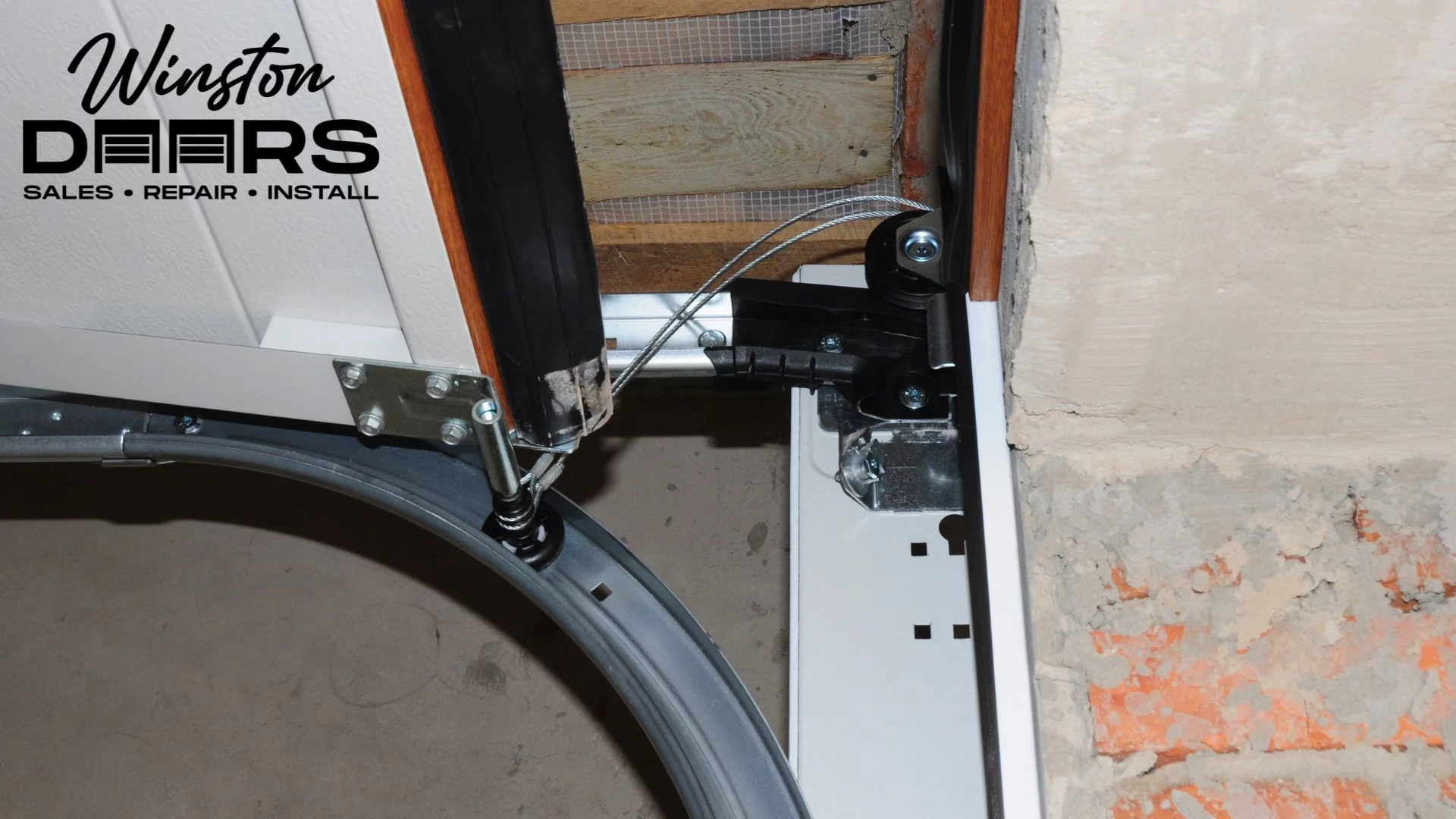 Close-up Detailed Photo of Garage Door Roller on Track