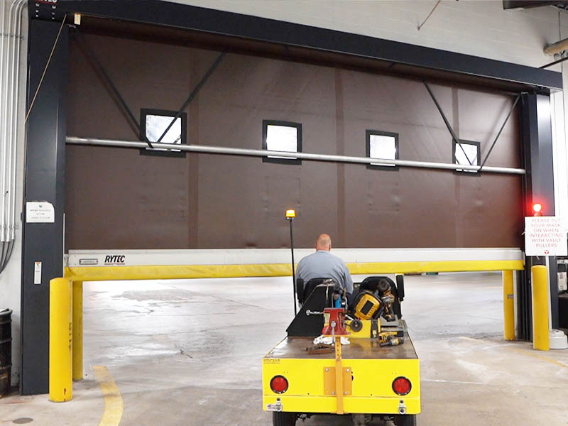 How high-speed doors help keep warehouse workers safe | Rytec