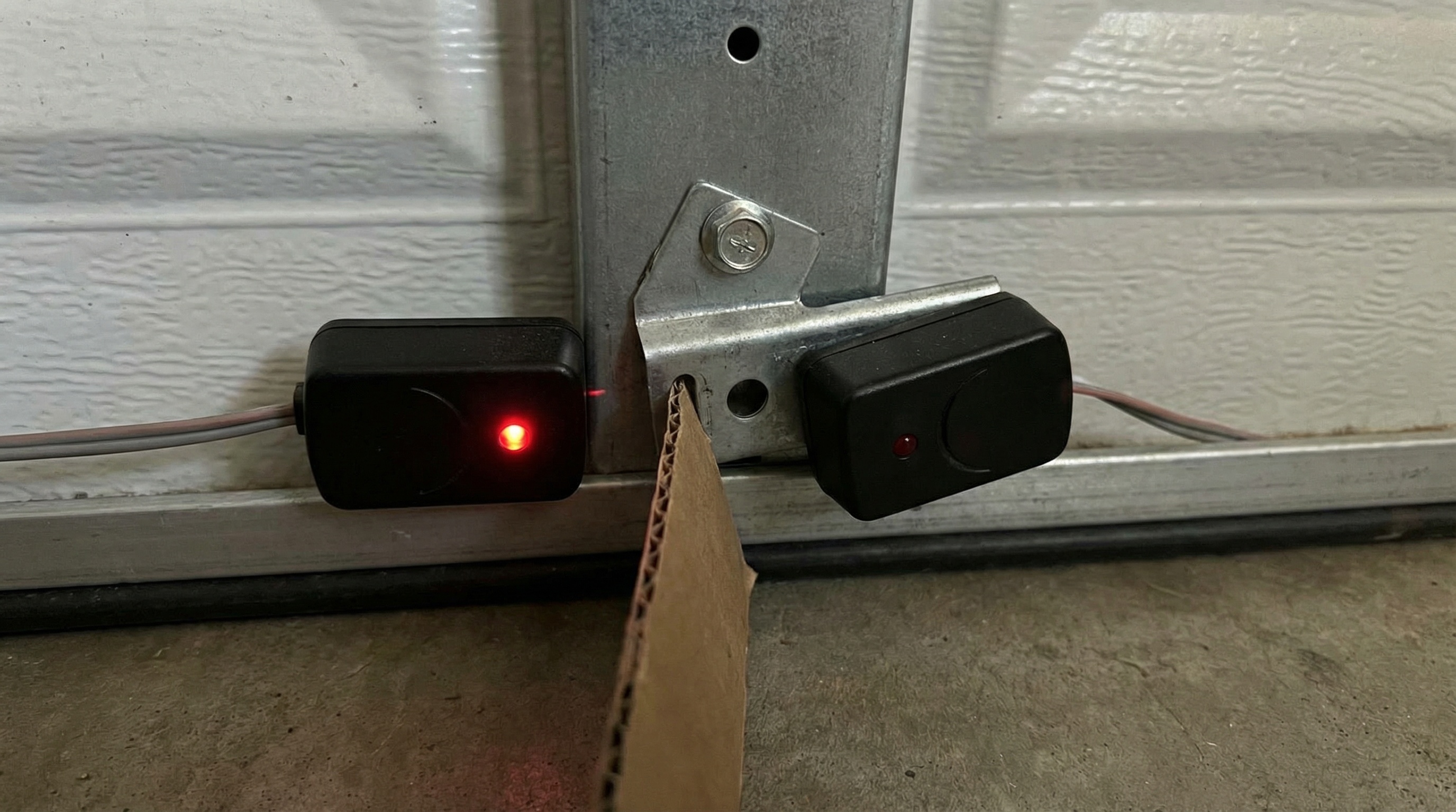 garage door safety sensors showing misalignment