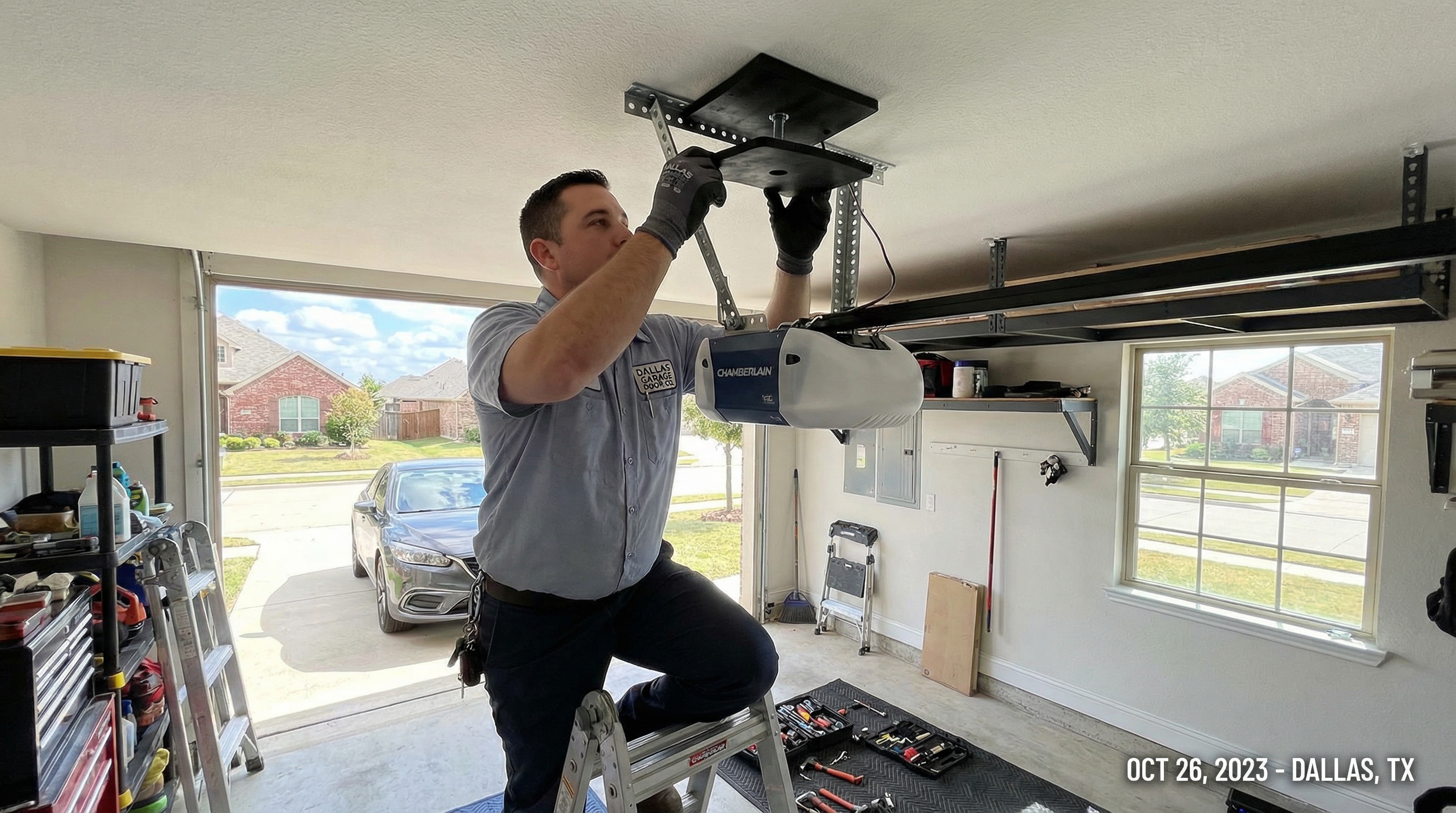 Professional technician installing vibration isolation pads on garage door opener in Milwaukee home