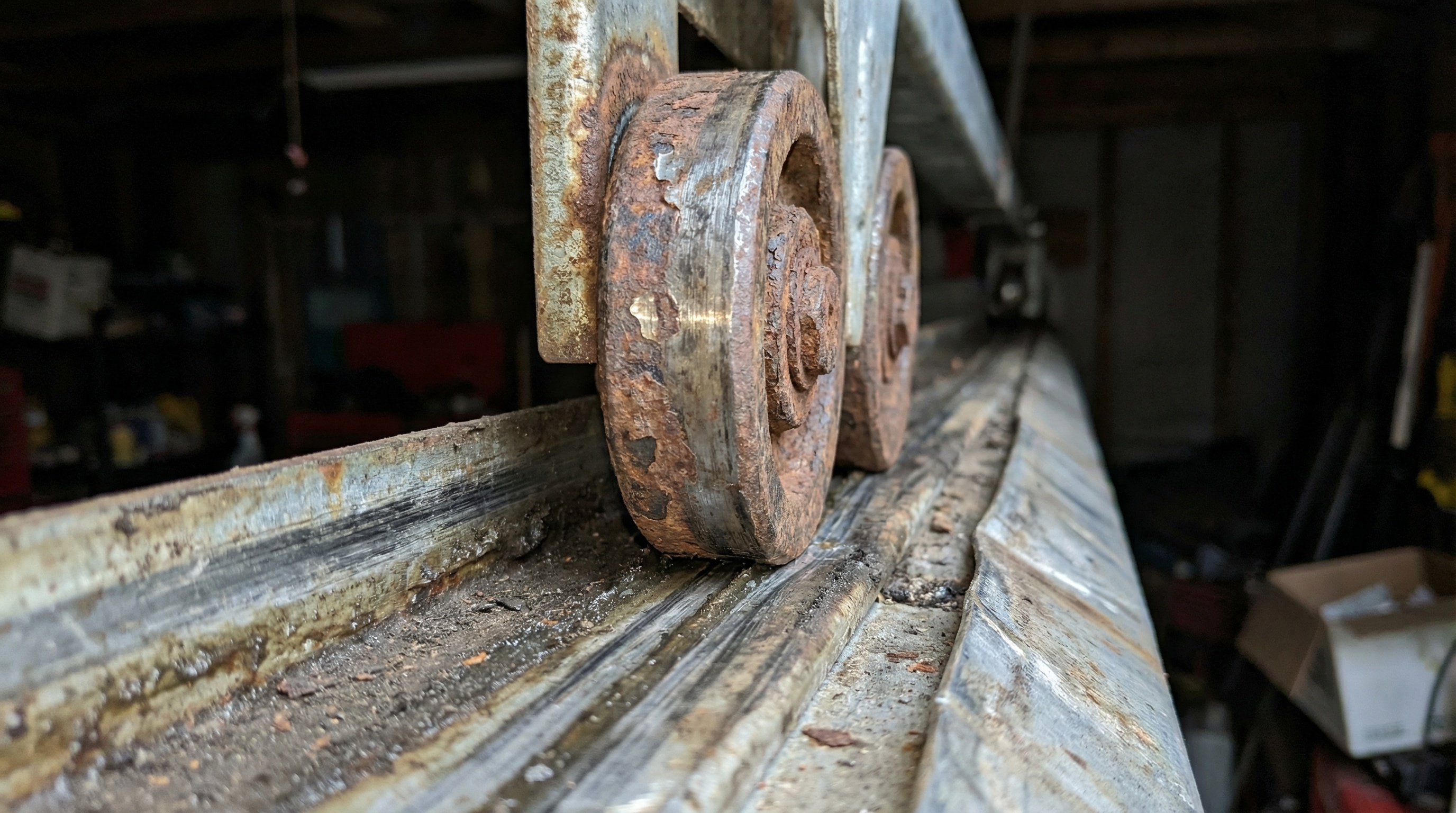Worn garage door rollers causing grinding noise