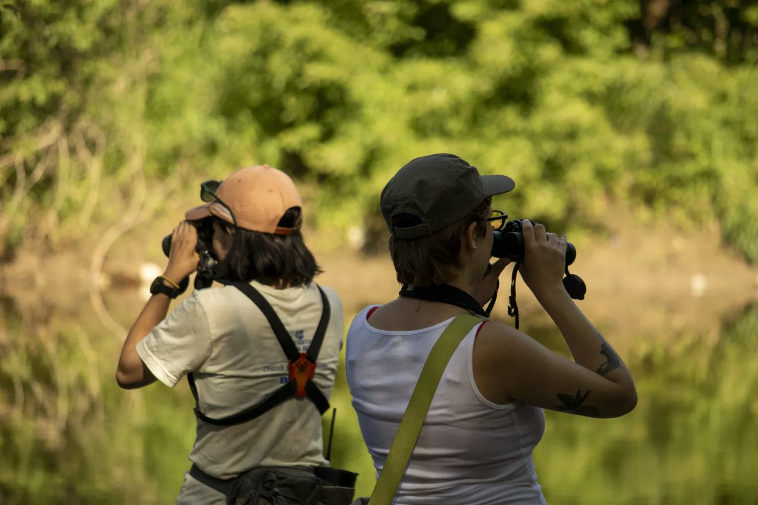 Two birders at the Milwaukee River