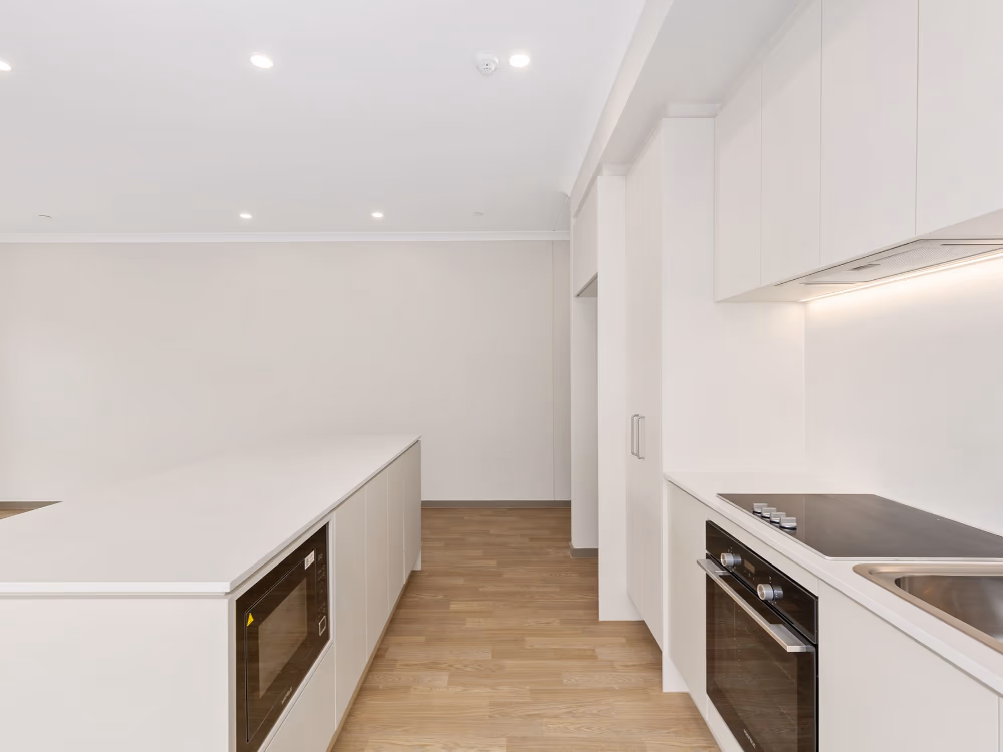 Sideview of the kitchen of InPlace Living's Improved Liveability SDA in Seaford