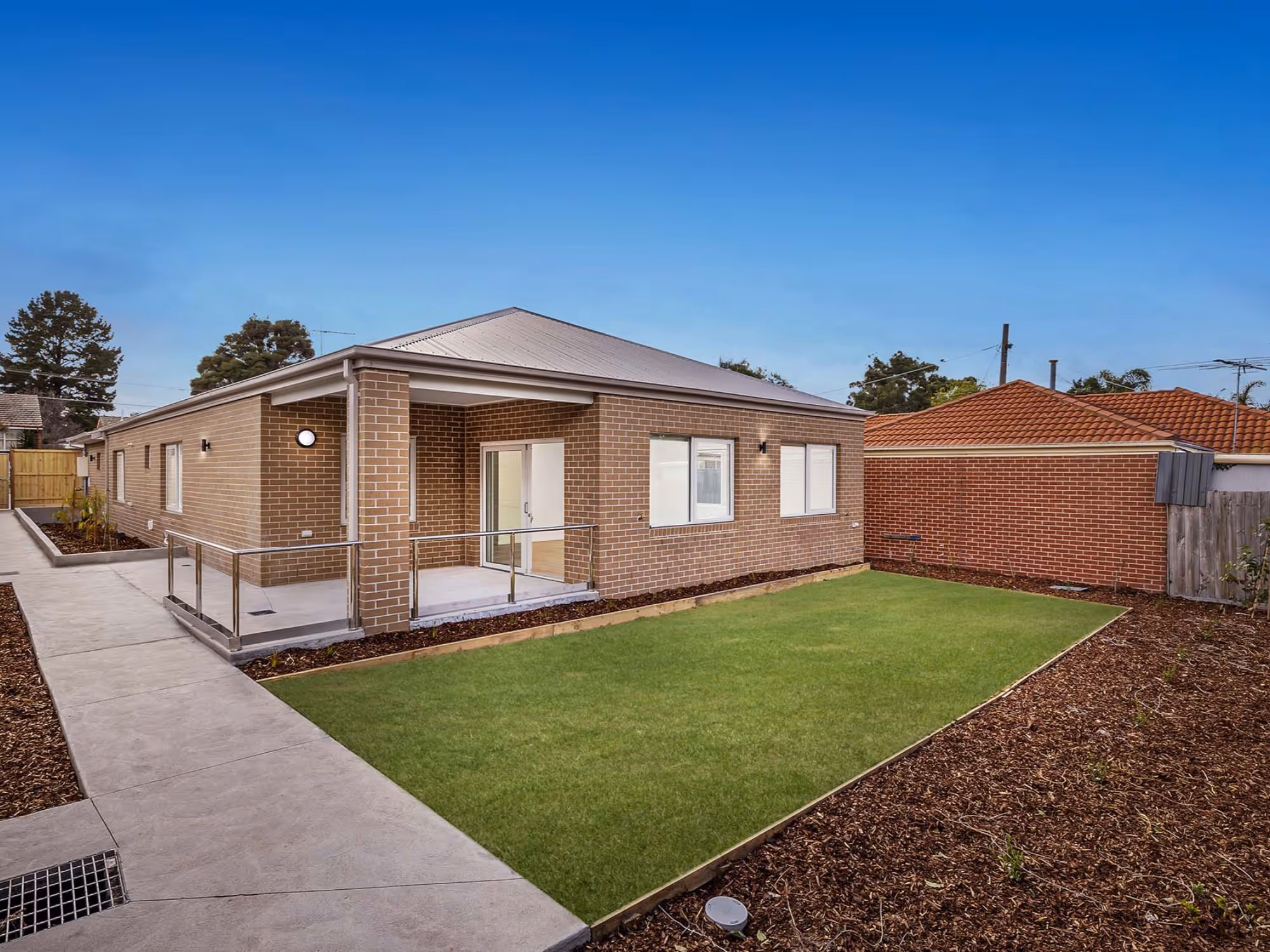 Backyard and rear view of InPlace Living's High Physical Support SDA in Jacana