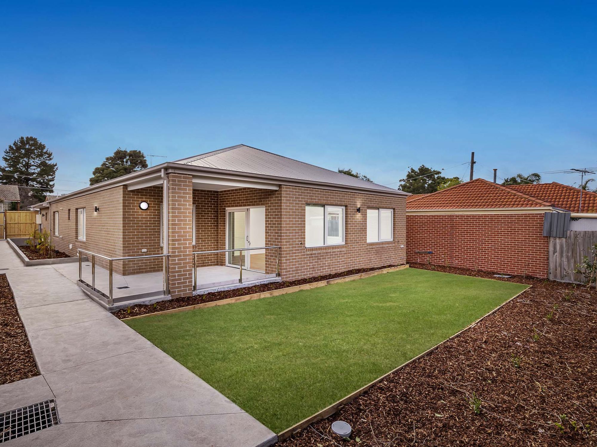 Backyard and rear view of InPlace Living's High Physical Support SDA in Jacana