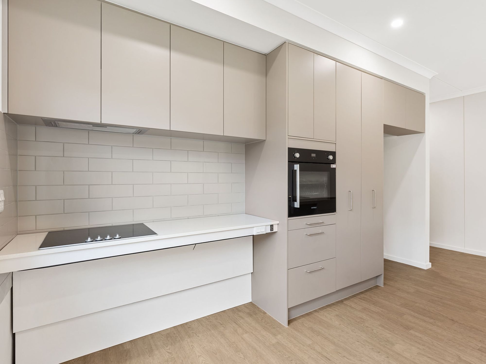 Side view of kitchen of InPlace Living's High Physical Suppport SDA in Pascoe Vale South