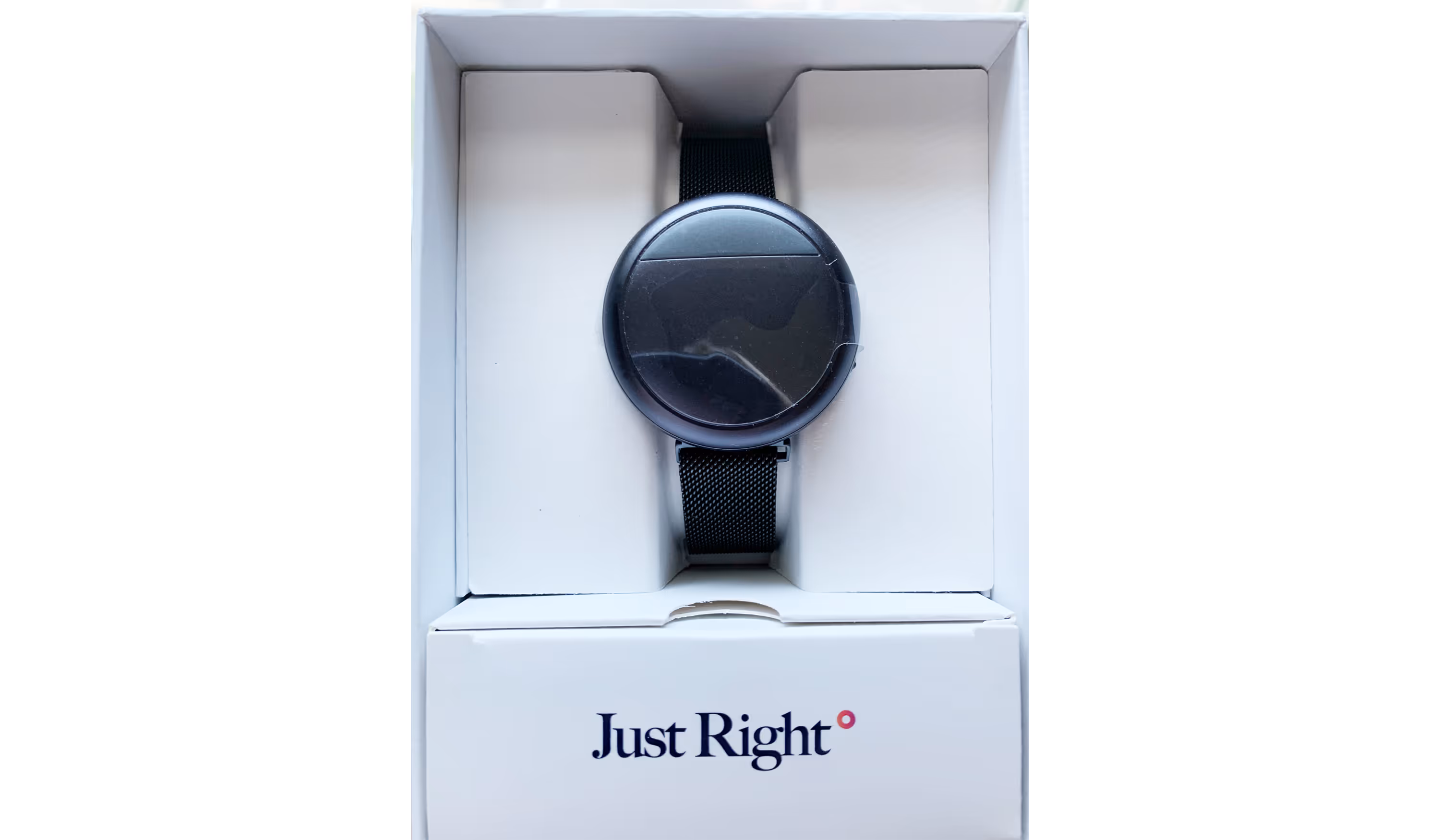 UX flow gallery image - Embr Wave device unboxing shows a black wearable device