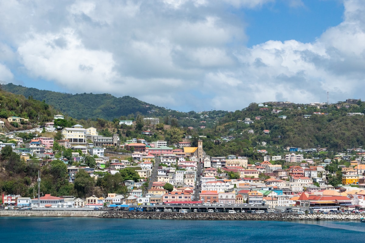 Grenada vs St. Lucia Citizenship by Investment 2026: E-2 Treaty, UK Access & The Refundable Bond Route Compared