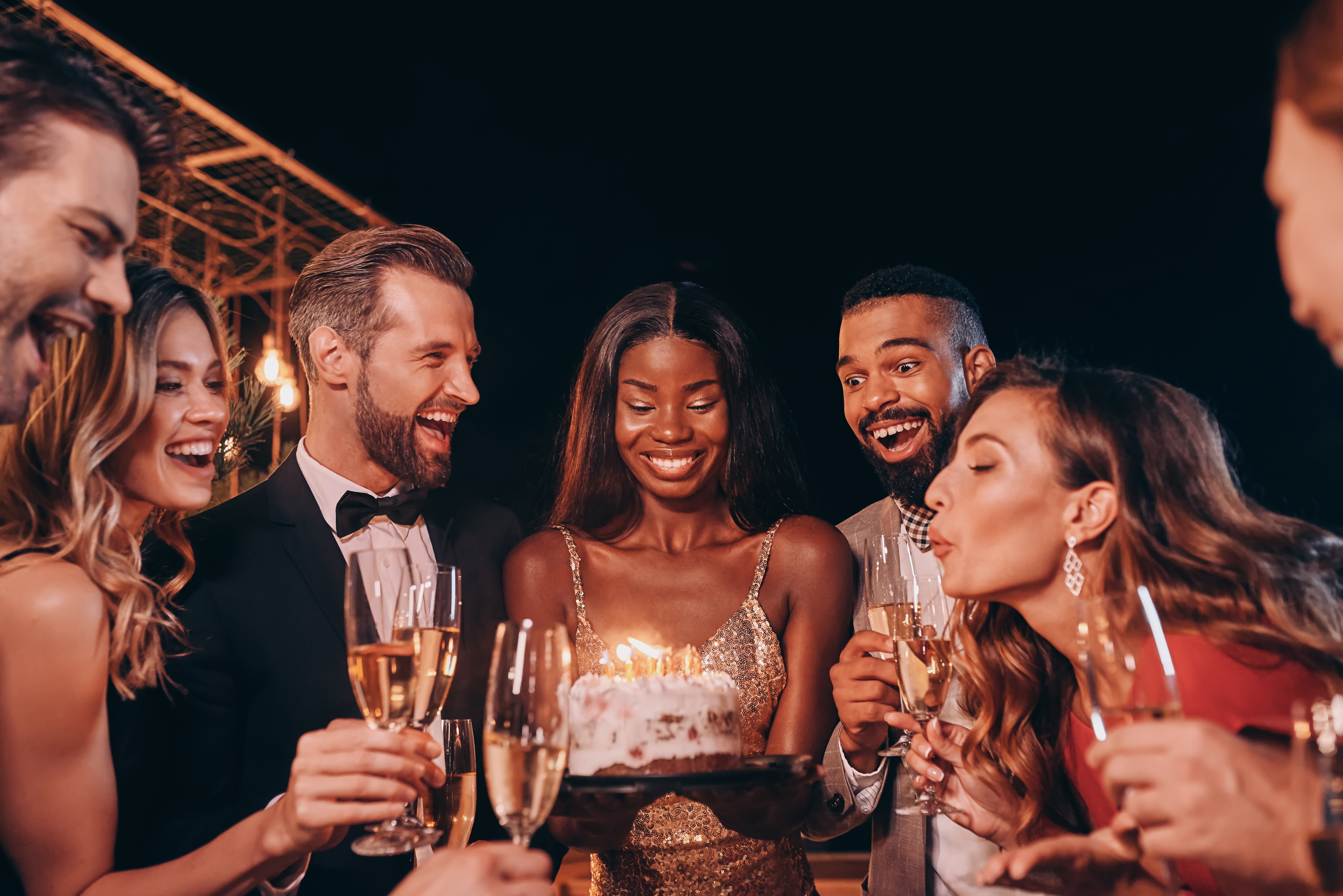 https://cdn.prod.website-files.com/64c20b61ae8773a0066d0afe/653643b33e0582cd877abd95_beautiful-young-woman-in-cokctail-dress-blowing-ca-2022-12-16-14-00-04-utc%20%281%29.jpg