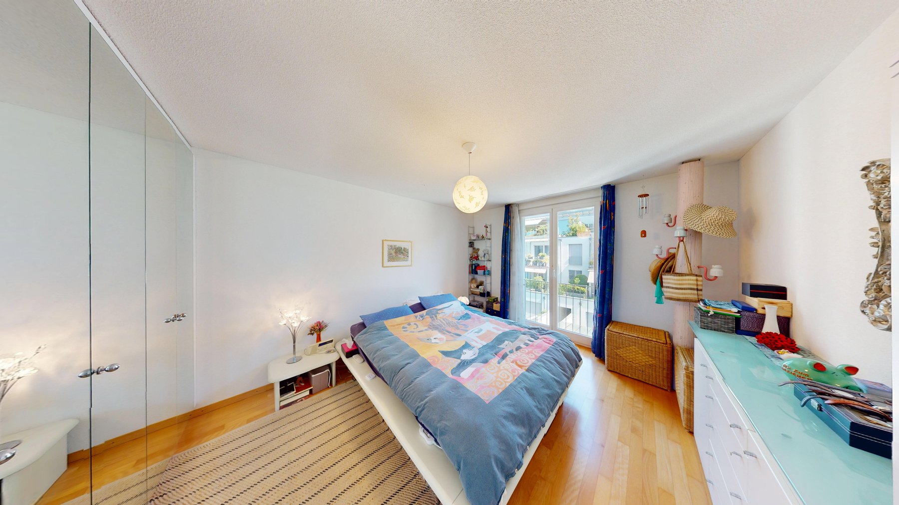 Schlafzimmer der Attika-Duplexwohnung in Ittigen
