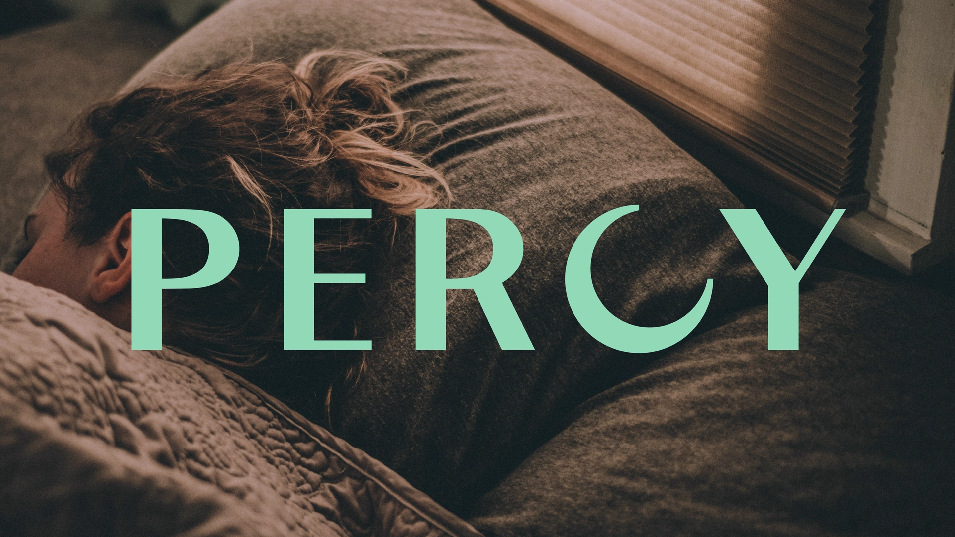 Image of woman sleeping with light aqua Percy logo overlaid