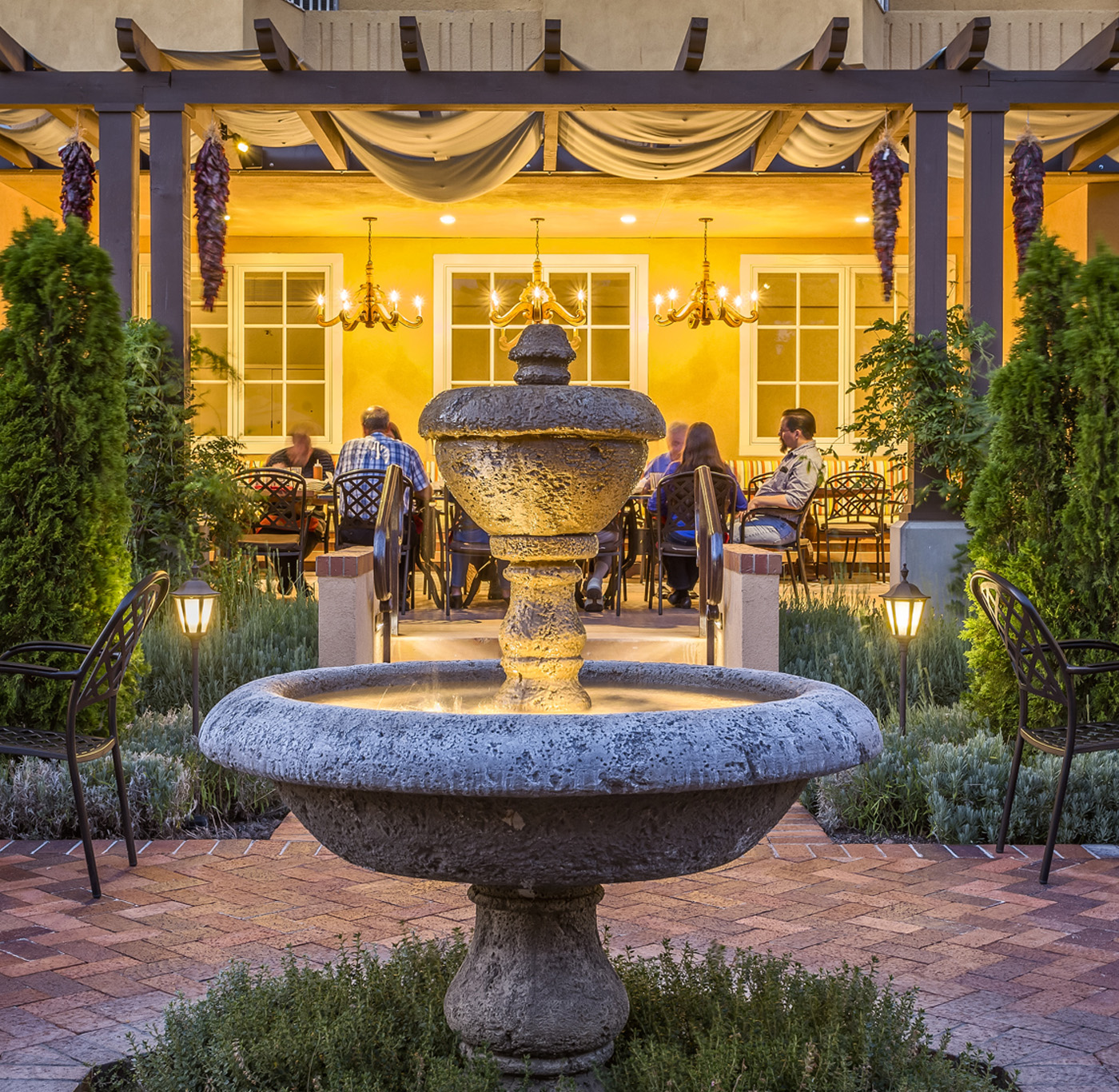 Garduno's patio with fountain and people dining