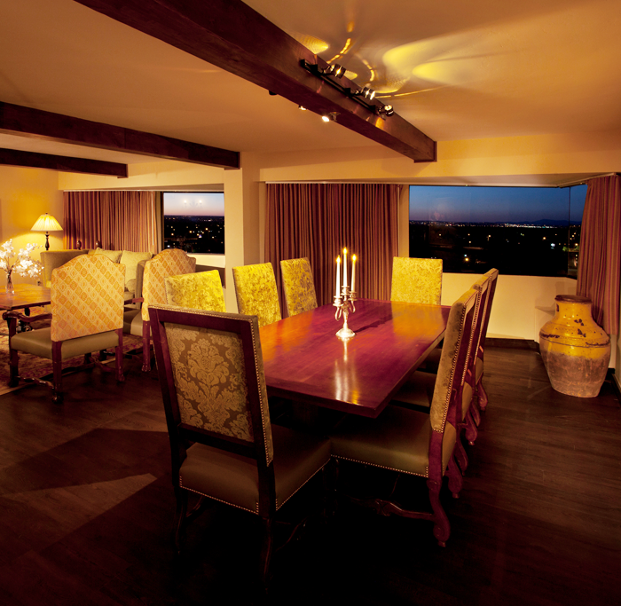 Presidential Suite living room with dining table and additional 