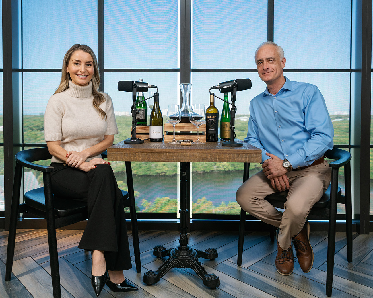 Amanda Pearson and Albert Black at the podcast table