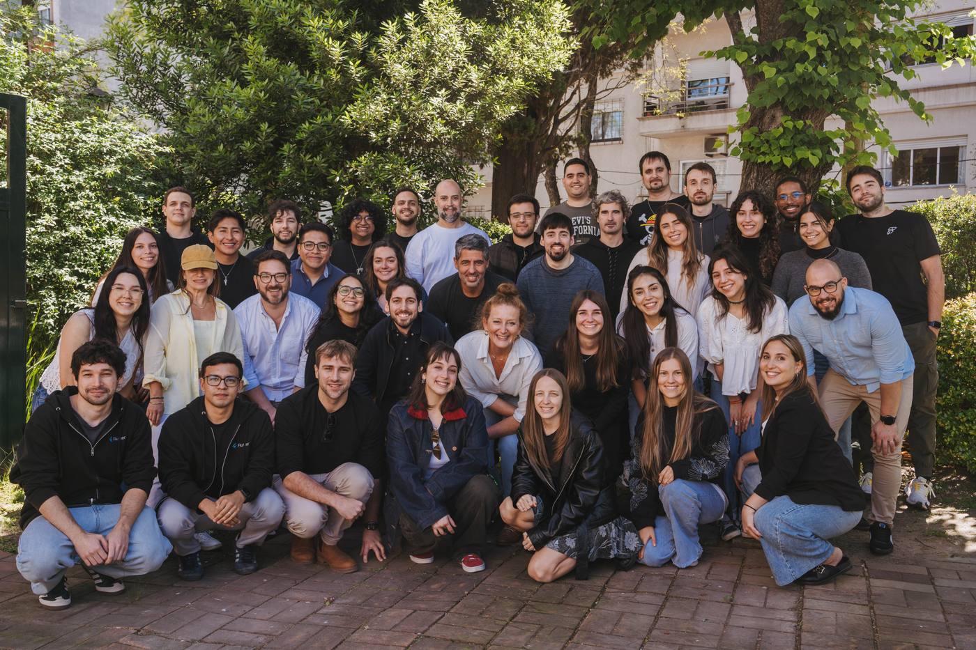 The Somnio Software team gathered outdoors at the office