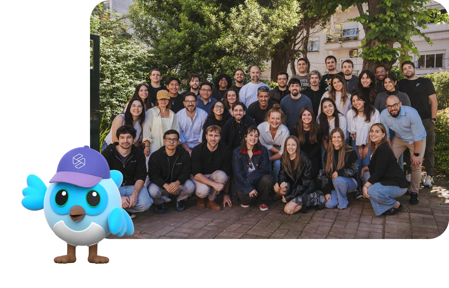The Somnio team gathered outdoors, with the Dash mascot
