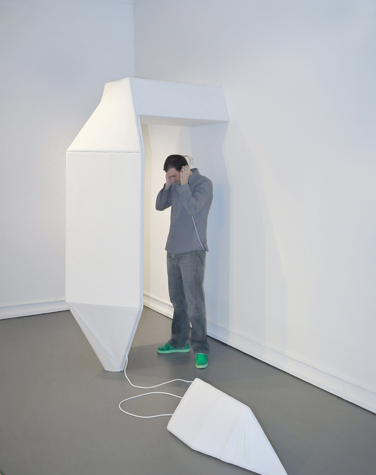 An immersive sculpture by artist Ryan Hackett titled Monarch Isolation Booth, installation view.