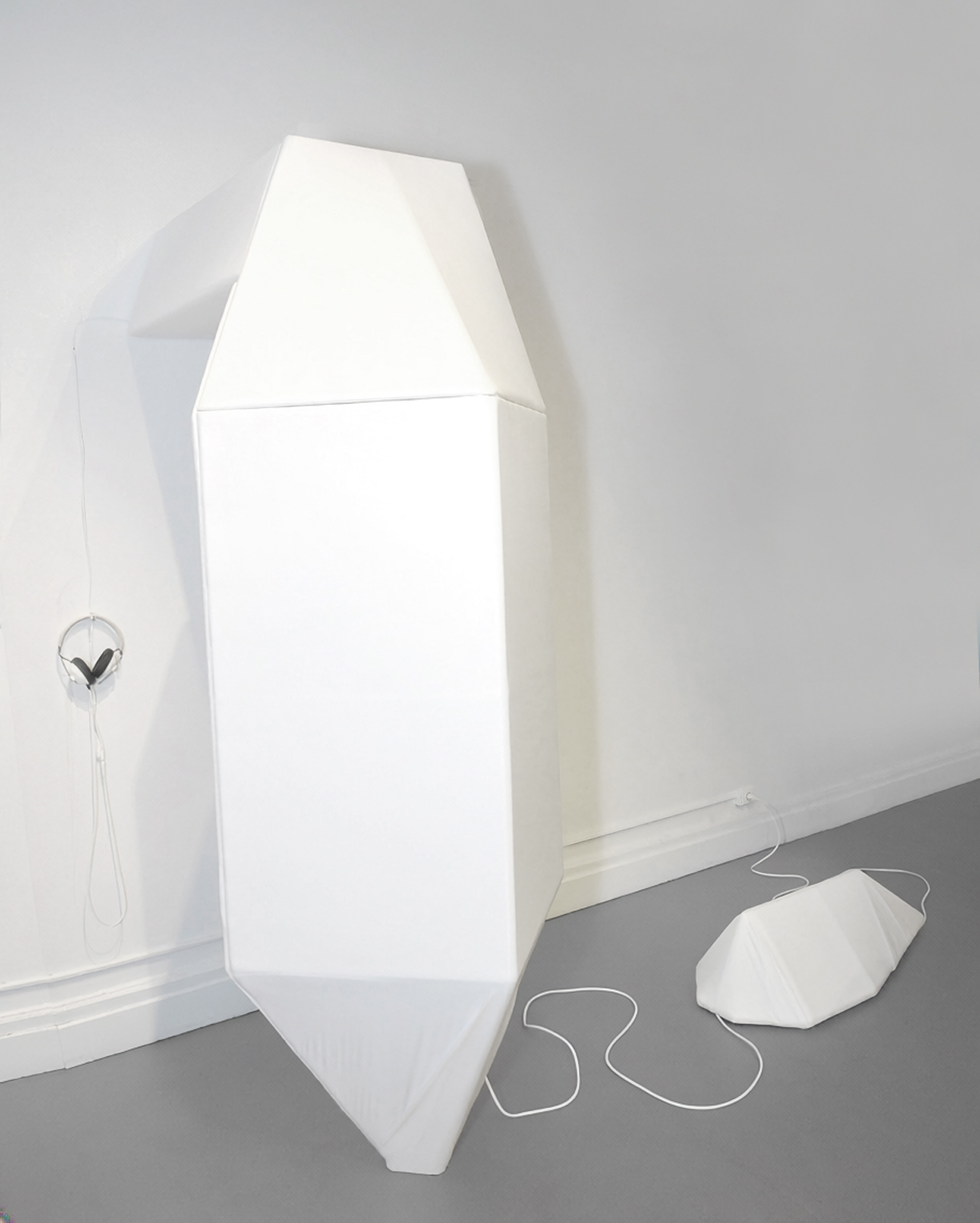 An immersive sculpture by artist Ryan Hackett titled Monarch Isolation Booth. Click on this image to learn more about the work, view other angles, and listen to its sound.