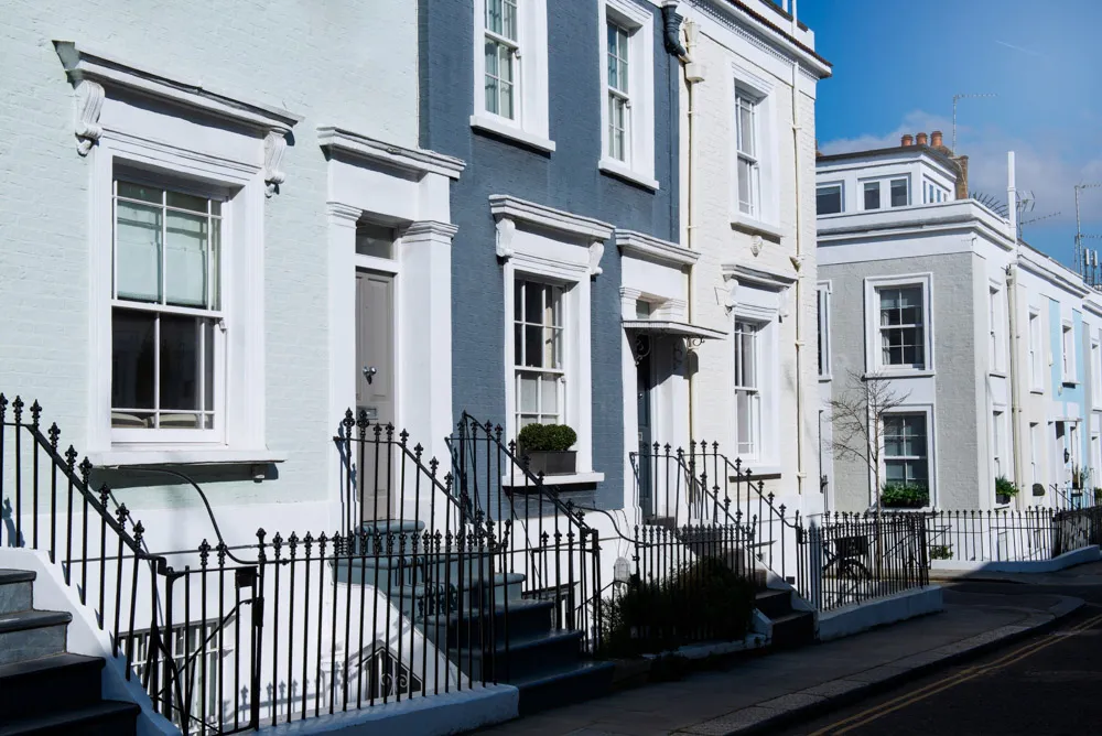 A row of white and blue houses