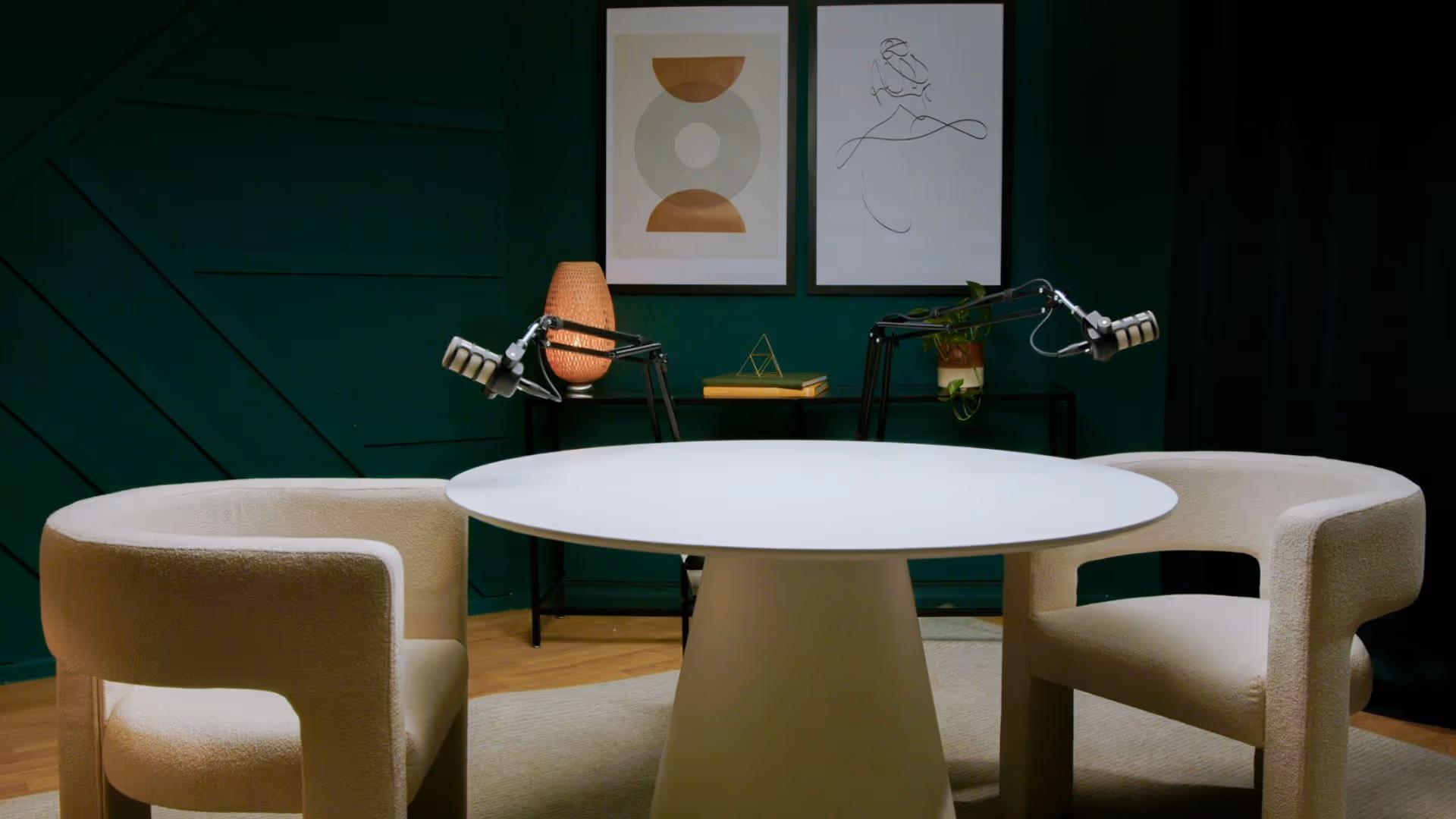 a room with a round table and two chairs