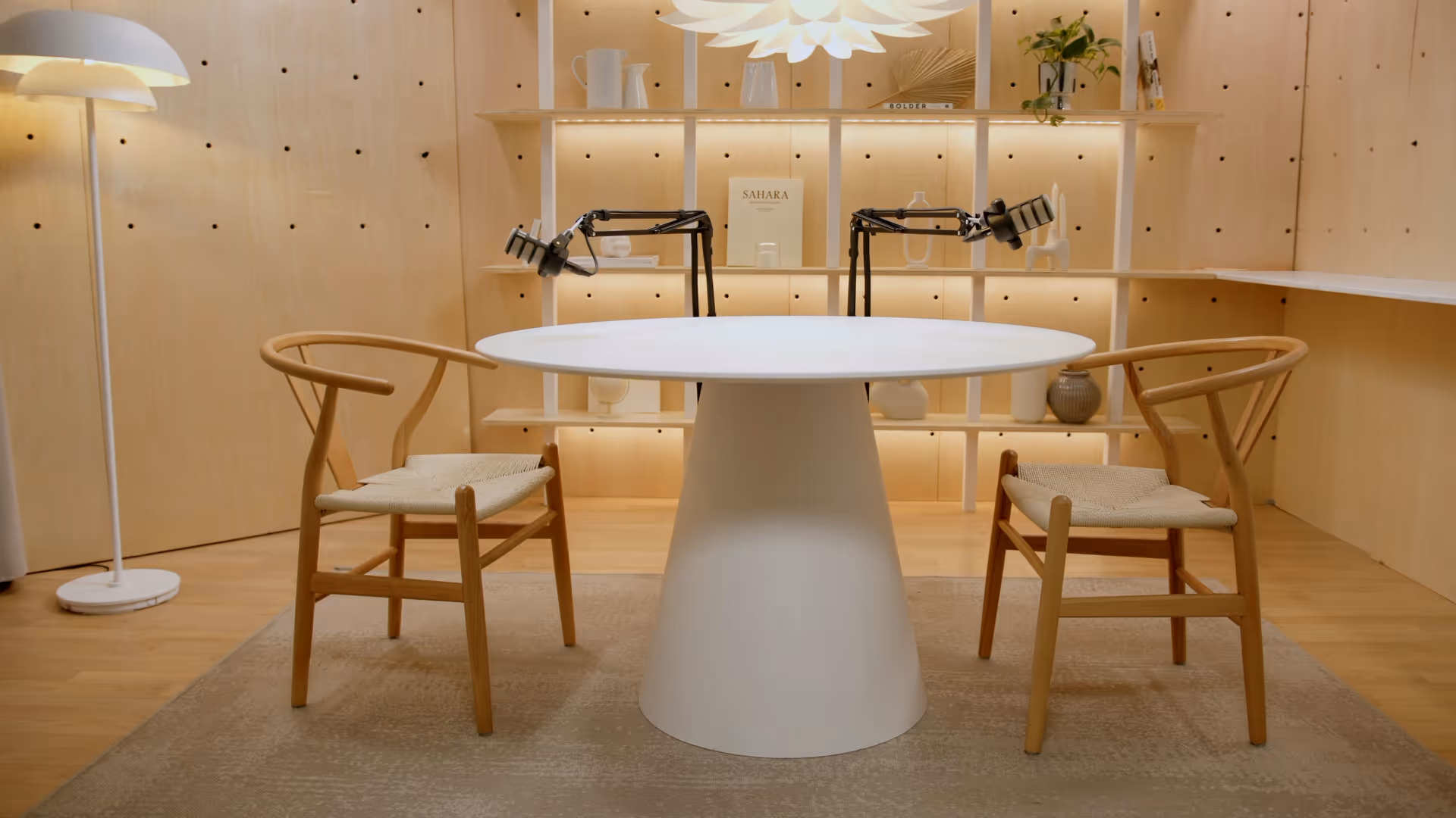 a table with chairs in a room