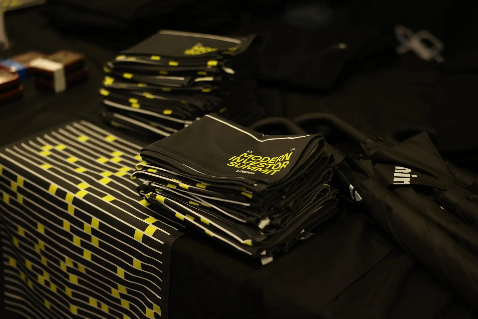 Stacks of Modern Investor Summit London tote bags