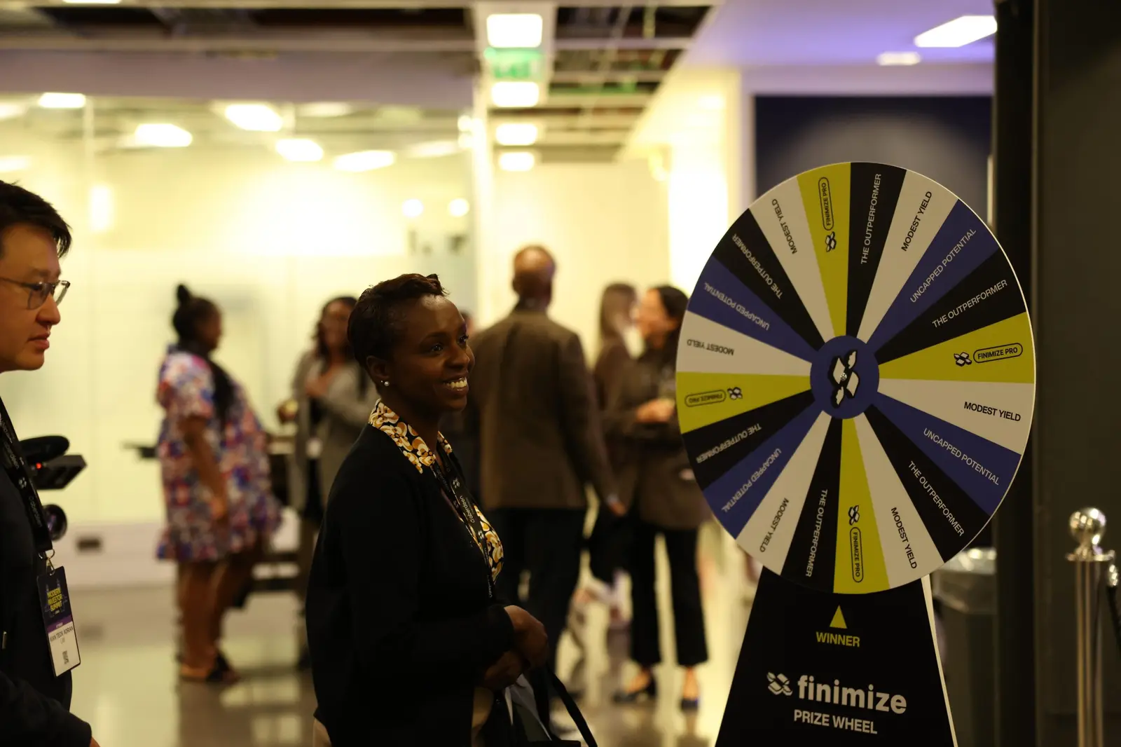 An attendee at the Finimize prize wheel