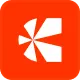 White abstract shape resembling a star or asterisk on an orange square background.