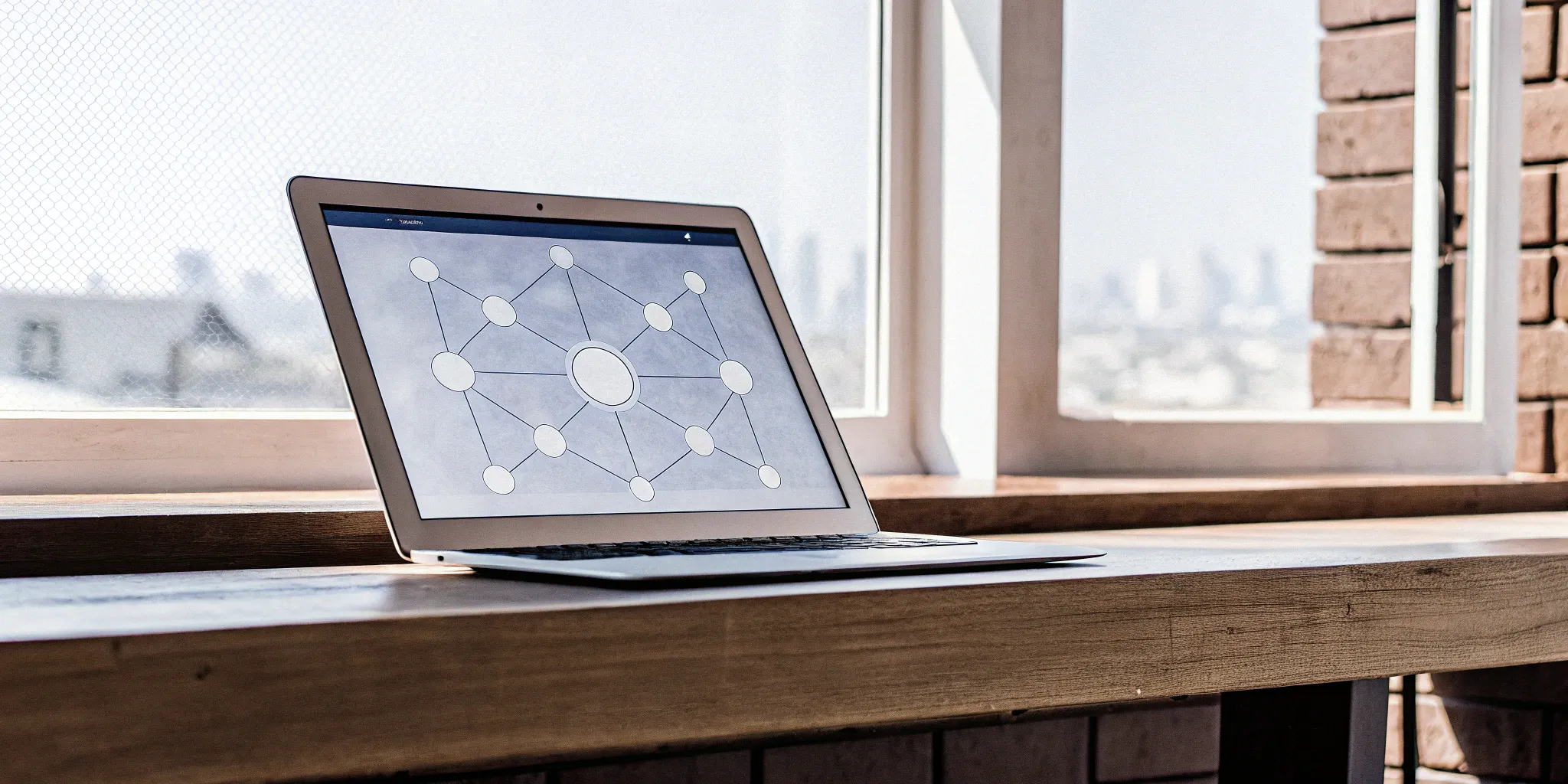Recurly-NetSuite integration diagram displayed on a laptop.