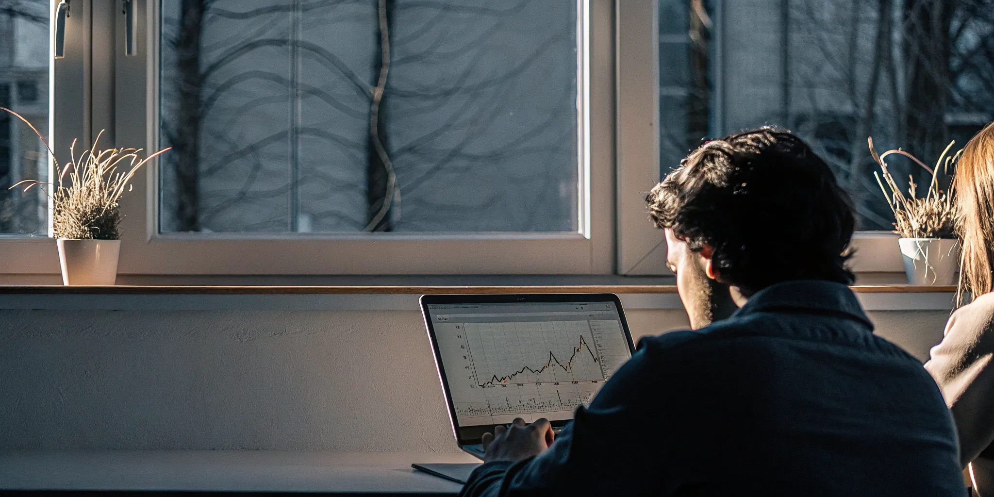 Stripe revenue recognition data analysis on laptop.