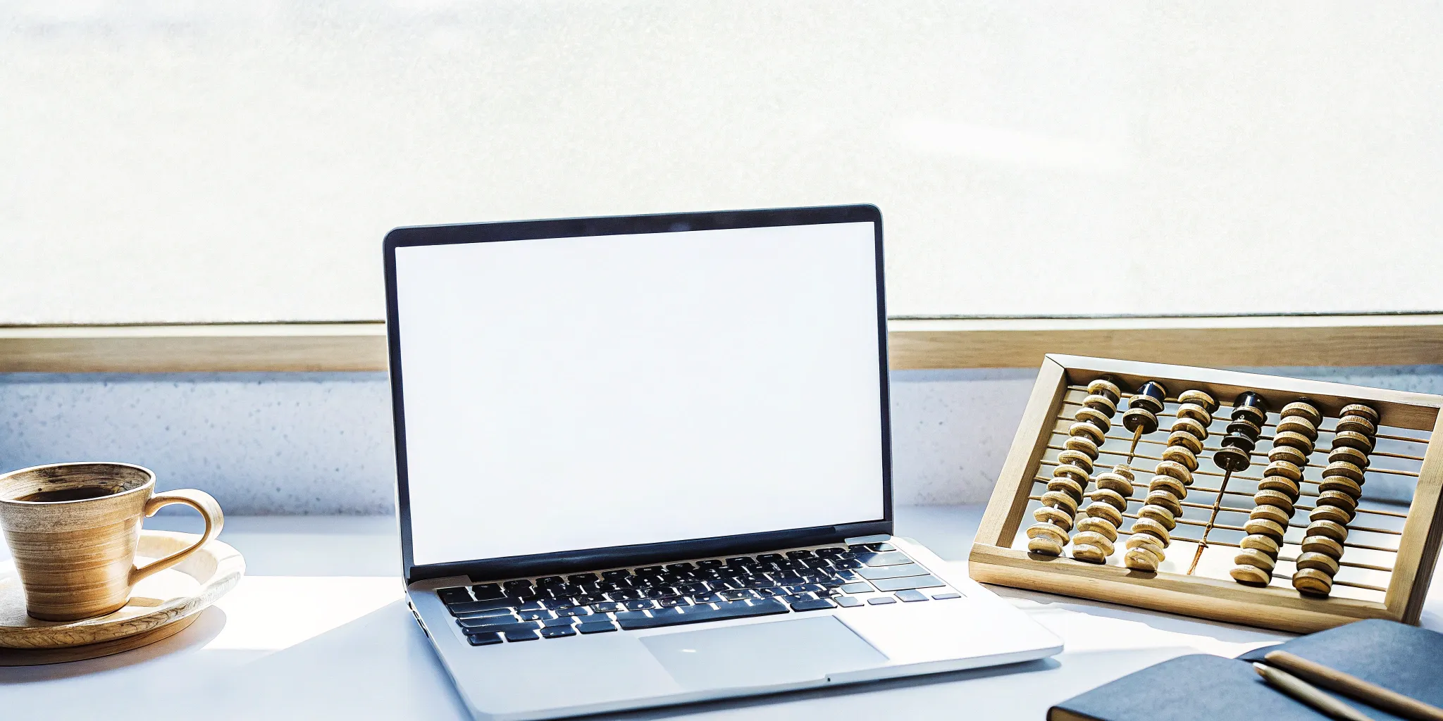 Preparing answers to revenue accounting interview questions on a laptop.