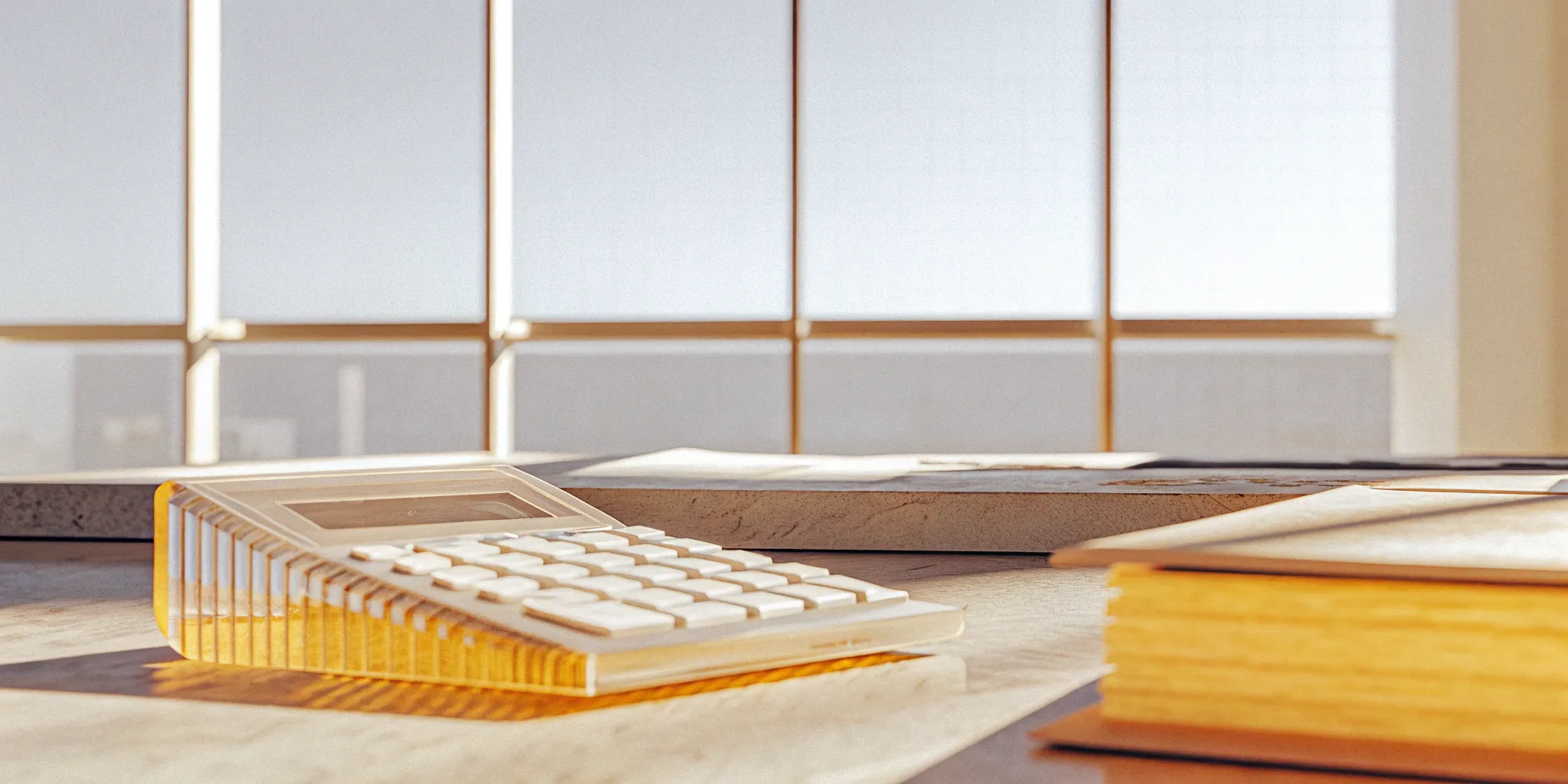 A calculator and financial documents on a desk for payback period analysis.
