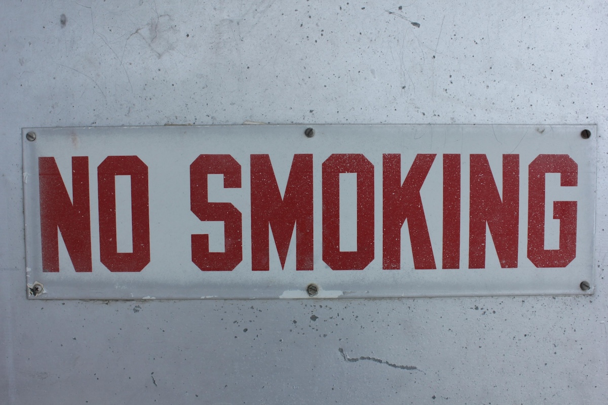 Close-up of a No Smoking Plaque on a Wall